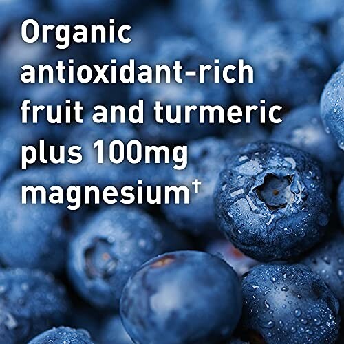 Close-up of blueberries with text about organic antioxidant-rich fruit, turmeric, and magnesium.